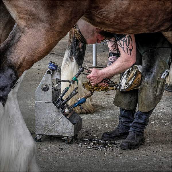 i0601.jpg - Blacksmith at Work