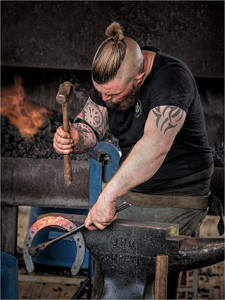 i0604.jpg - Blacksmith at Work